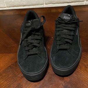 Womens all black Pumas